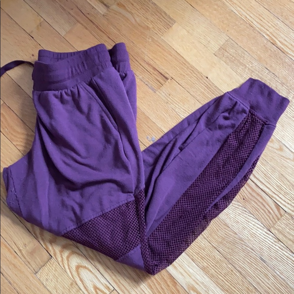 Burgundy sweat pants with mesh sides